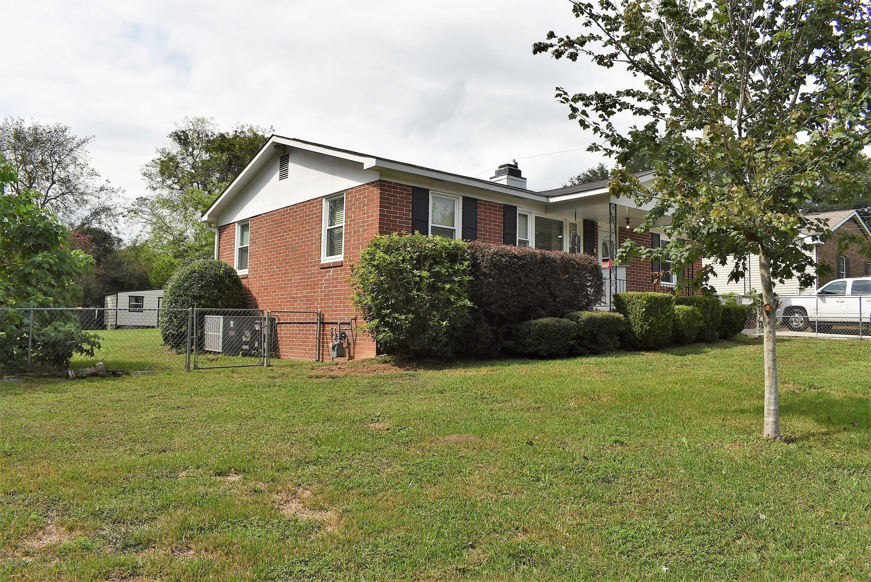 4825 Brookhaven Road Macon, GA 31206 - Photo 29 of 30 a front view of a house with a garden