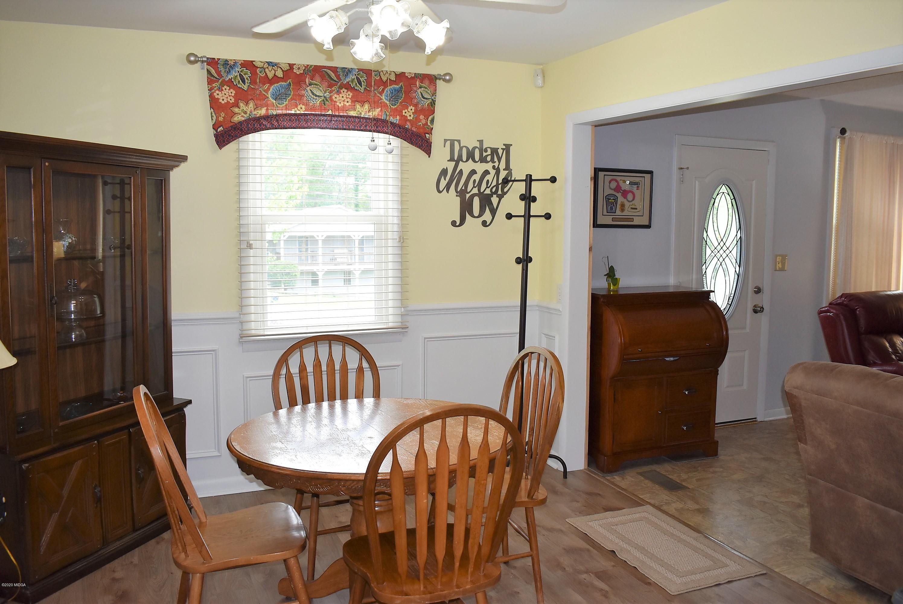 4825 Brookhaven Road Macon, GA 31206 - Photo 6 of 30 a view of a dining room with furniture and window