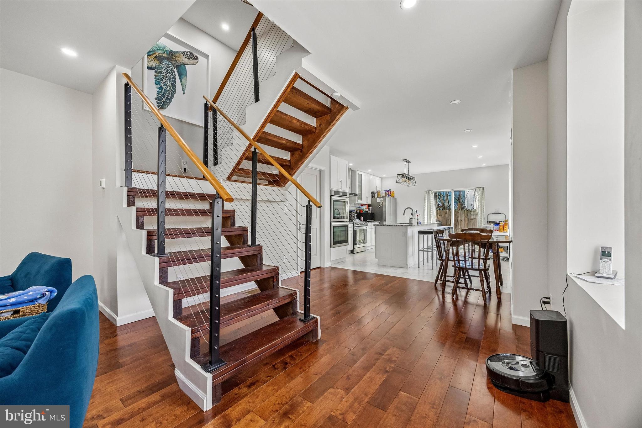 217 Grape Street Philadelphia, PA 19128 - Photo 2 of 27 a view of entryway and hall with wooden floor