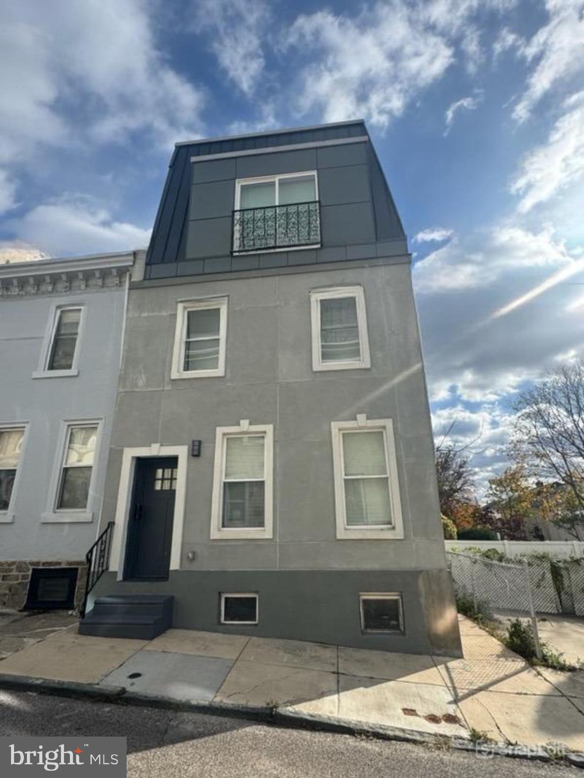 217 Grape Street Philadelphia, PA 19128 - Photo 25 of 27 a front view of a house