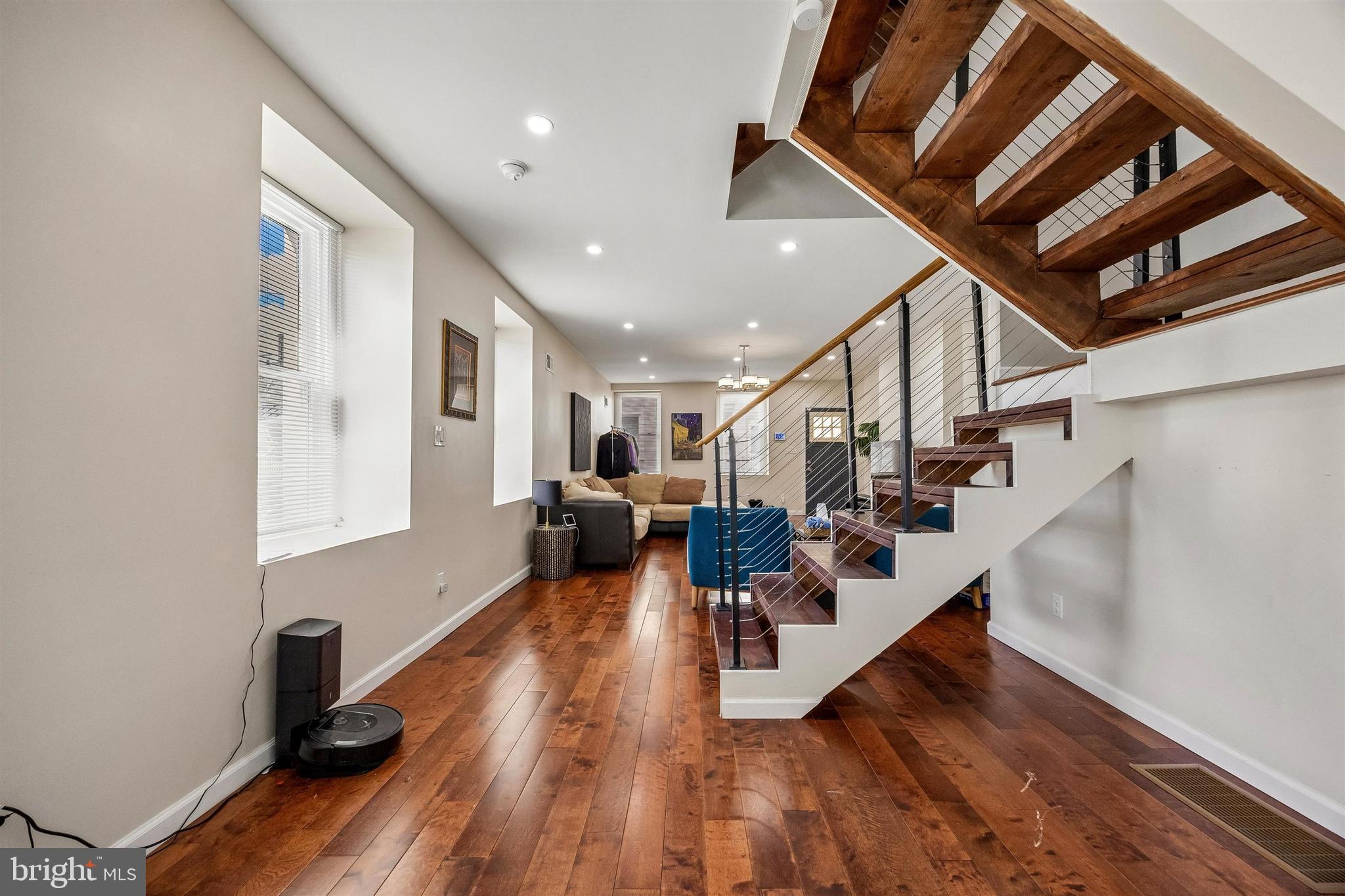 217 Grape Street Philadelphia, PA 19128 - Photo 4 of 27 a living room with furniture and wooden floor