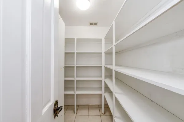 a view of backyard with porch and wooden floor