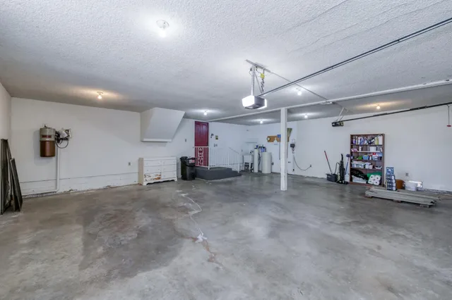 a view of a swimming pool with a yard