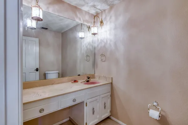 a house with trees in the background