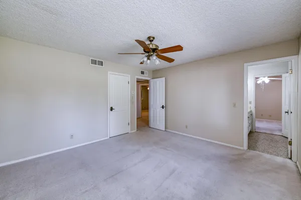 a house with trees in the background