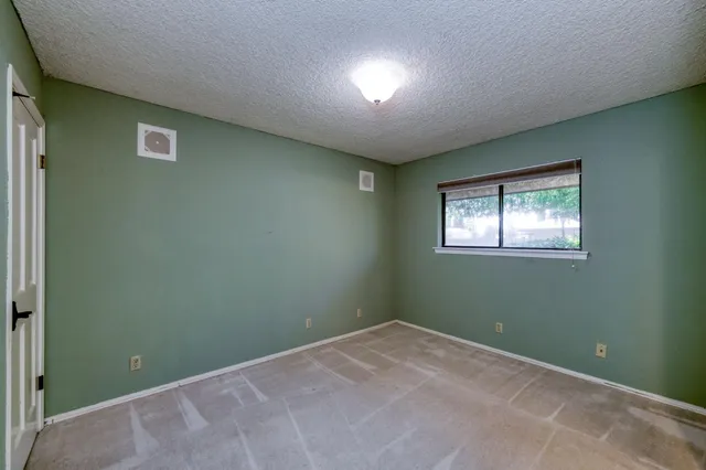 a garden view with a seating space