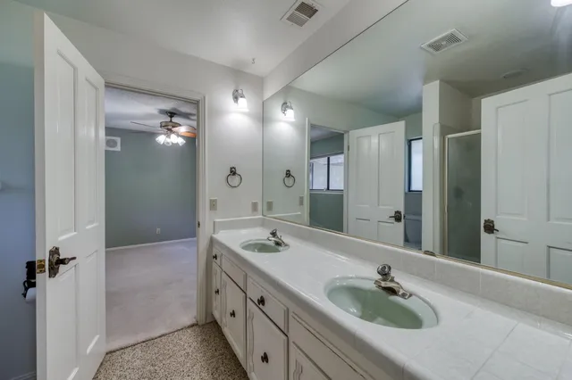 an aerial view of a house with yard swimming pool and outdoor seating
