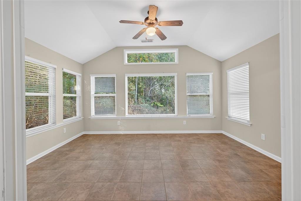 164 Cottage Club Drive Locust Grove, GA 30248 - Photo 18 of 56 a view of an empty room with a window