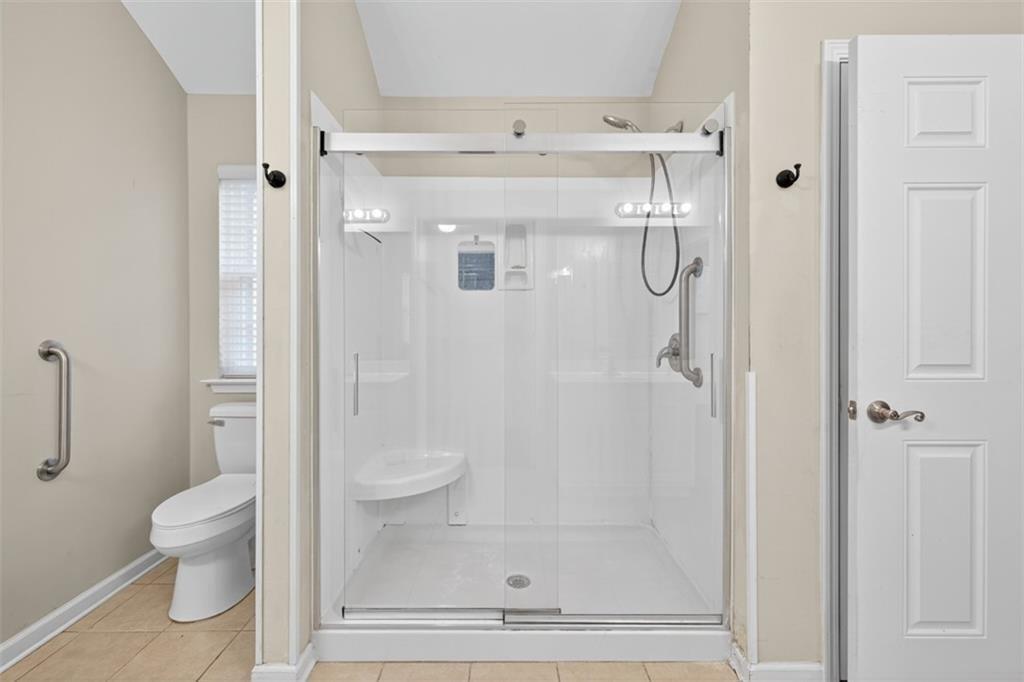 164 Cottage Club Drive Locust Grove, GA 30248 - Photo 39 of 56 a bathroom with a shower