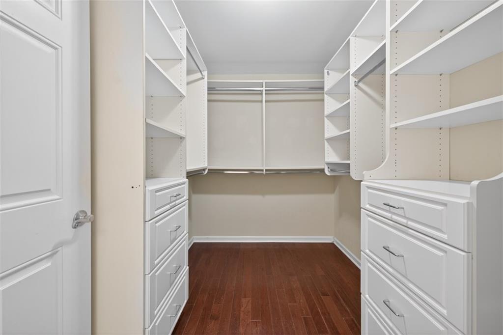 164 Cottage Club Drive Locust Grove, GA 30248 - Photo 41 of 56 a view of walk in closet with empty racks