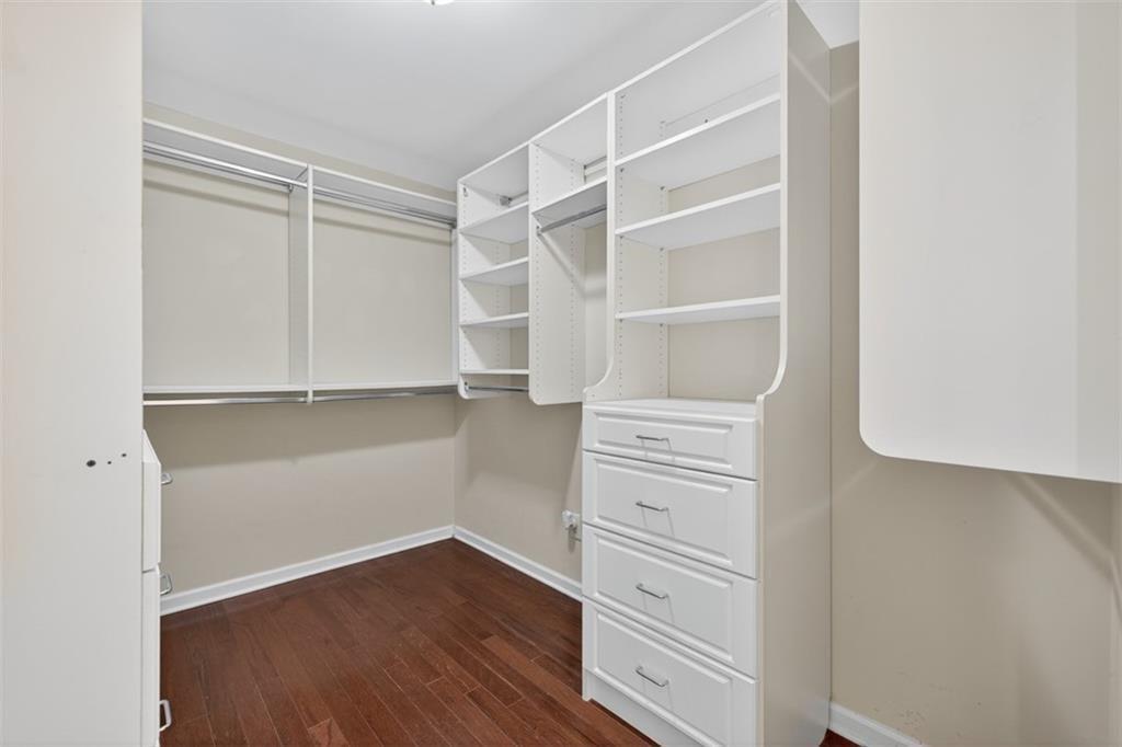 164 Cottage Club Drive Locust Grove, GA 30248 - Photo 42 of 56 a view of walk in closet with empty racks