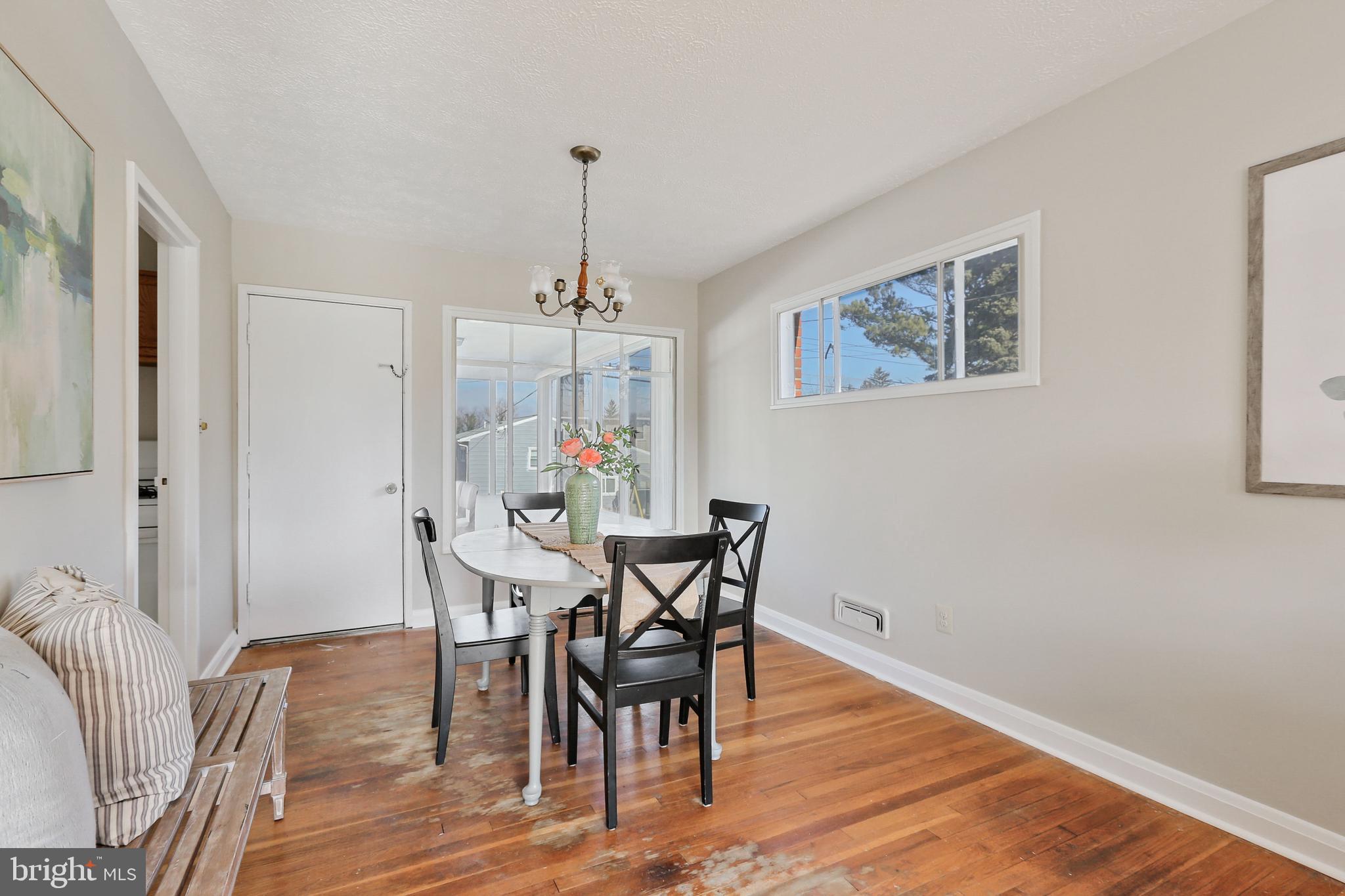 922 Prestwood Road Baltimore, MD 21228 - Photo 6 of 30 Dining area opens to large Sunroom