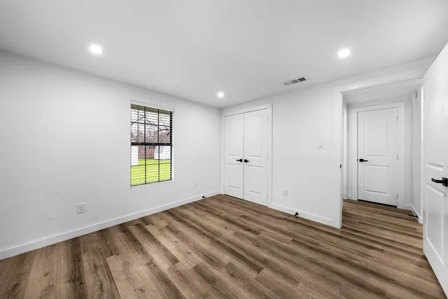 a view of an empty room and window