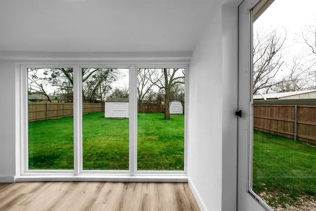 a view of a backyard with garden