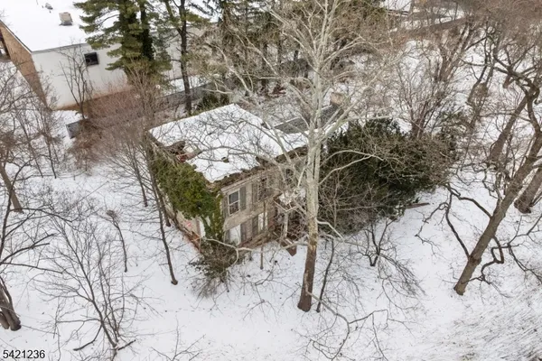 a view of a yard covered with snow