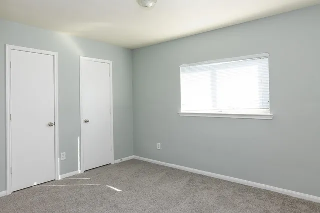 an empty room with a window