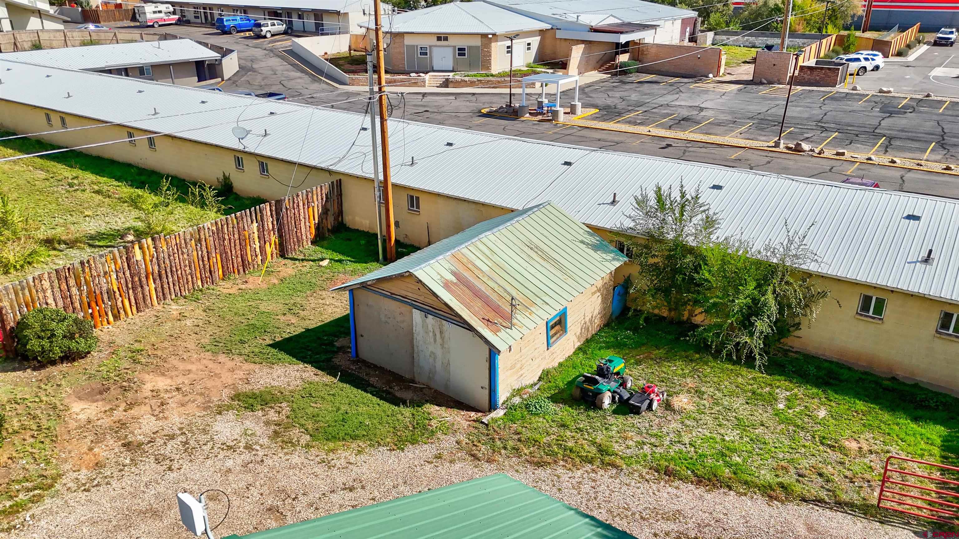 1118 East Main Street Cortez, CO 81321 - Photo 3 of 15 a view of a backyard with sitting area