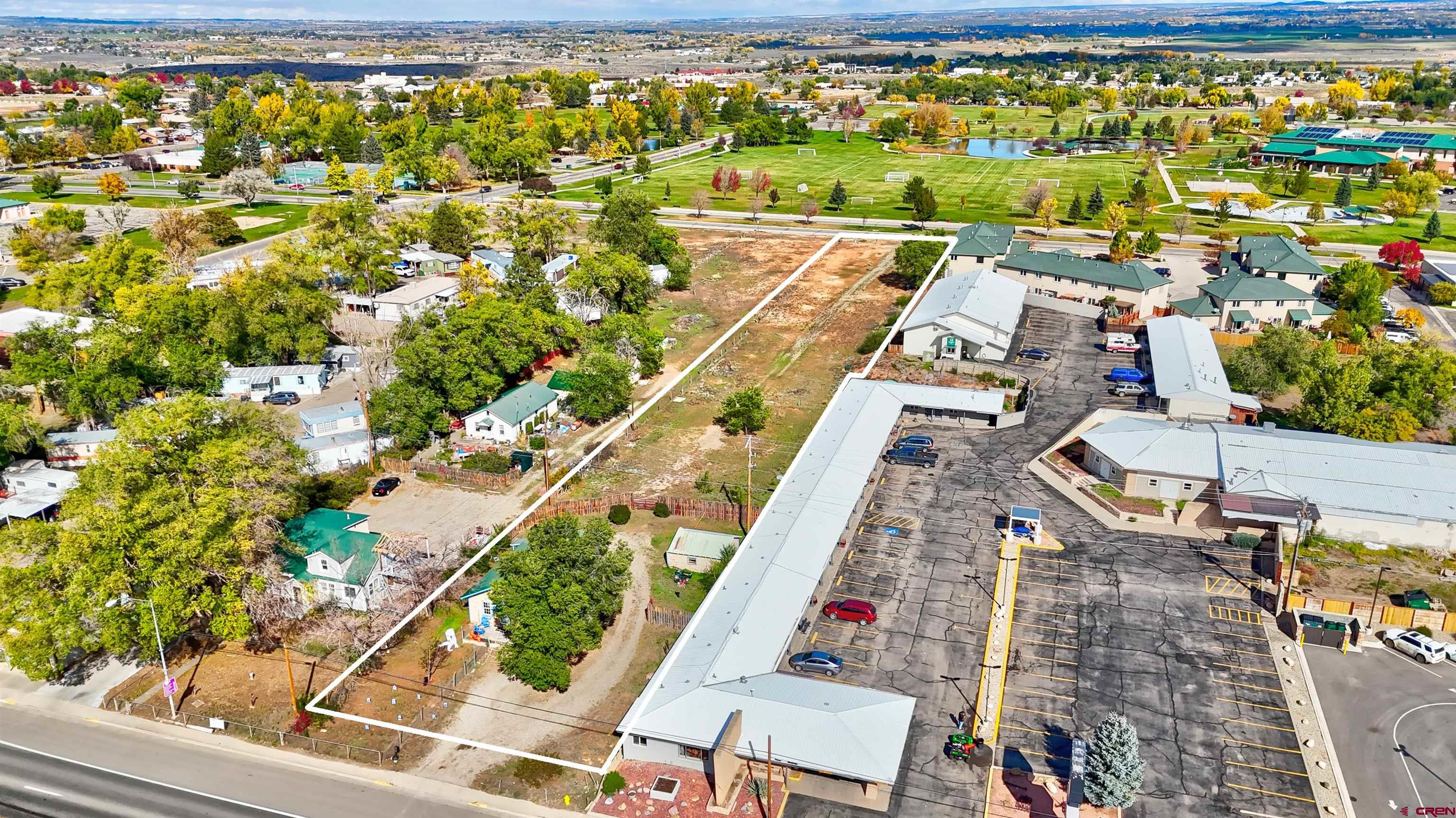 1118 East Main Street Cortez, CO 81321 - Photo 10 of 15 an aerial view of residential houses with outdoor space