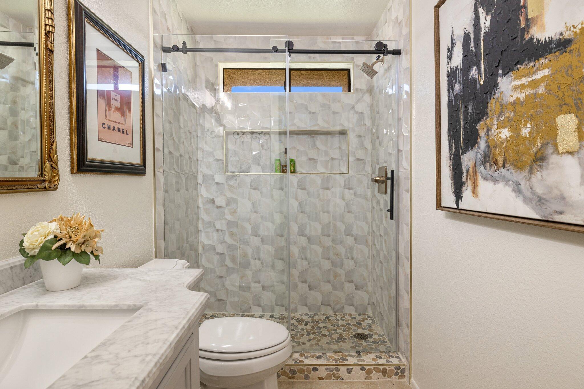 73750 Calle Bisque Palm Desert, CA 92260 - Photo 19 of 40 a bathroom with a sink a toilet and shower