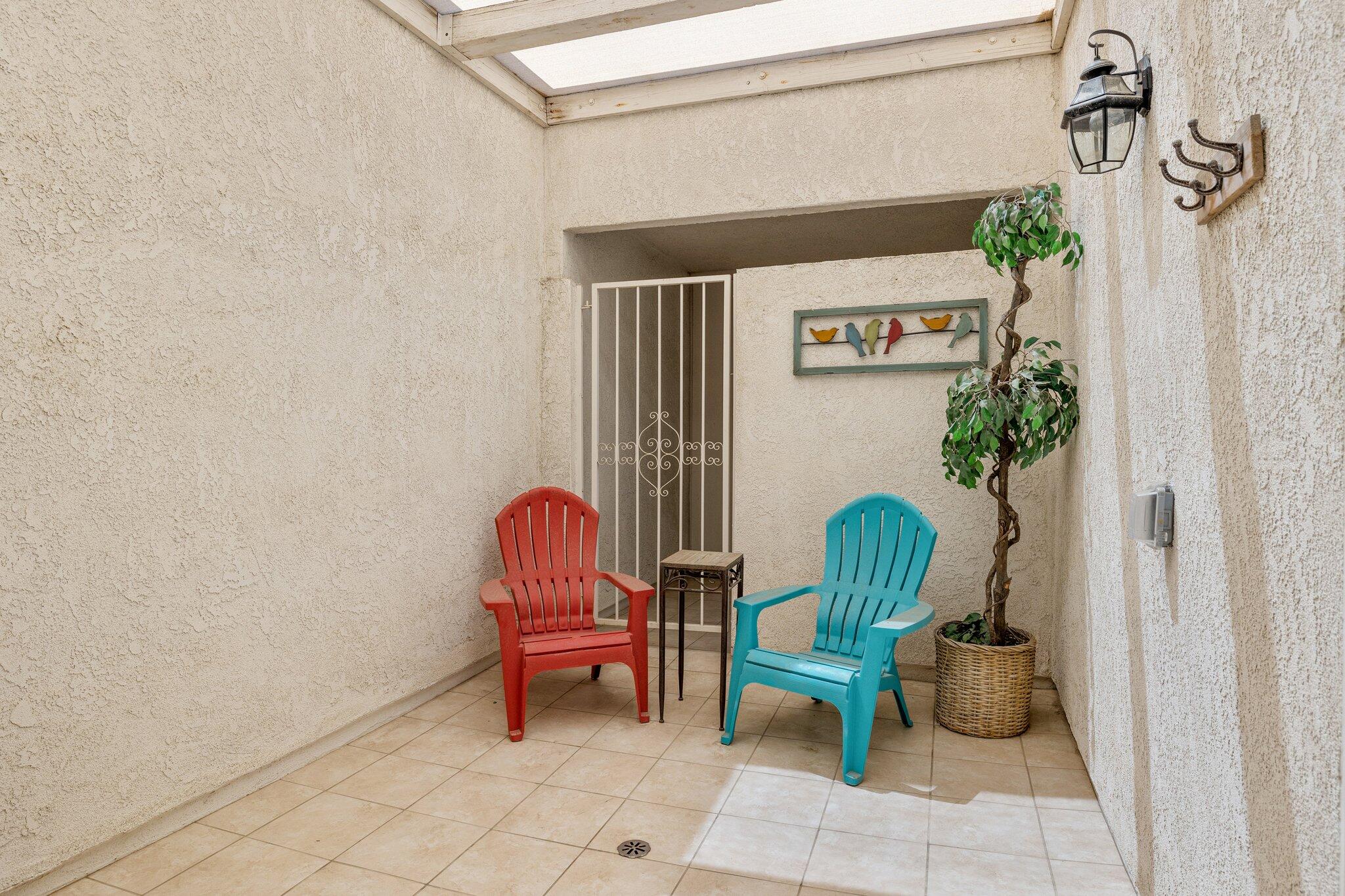 73750 Calle Bisque Palm Desert, CA 92260 - Photo 24 of 40 a couple of chairs sitting in patio of a house