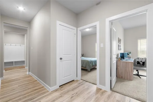 a view of a livingroom from a hallway