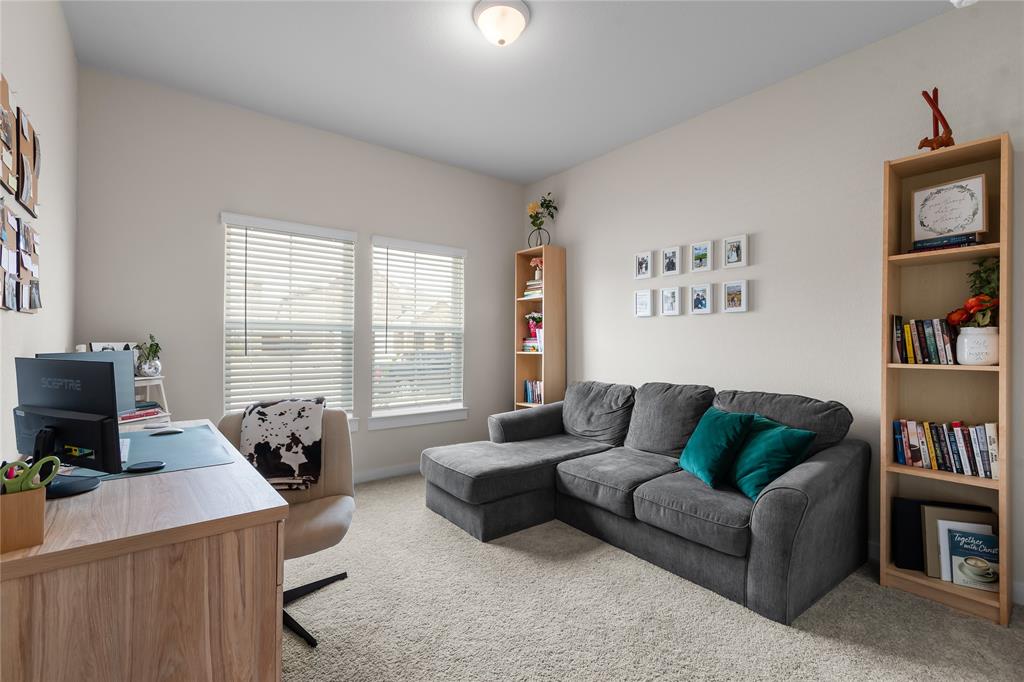 797 Vineyard Way Forney, TX 75126 - Photo 18 of 24 a living room with furniture and a window