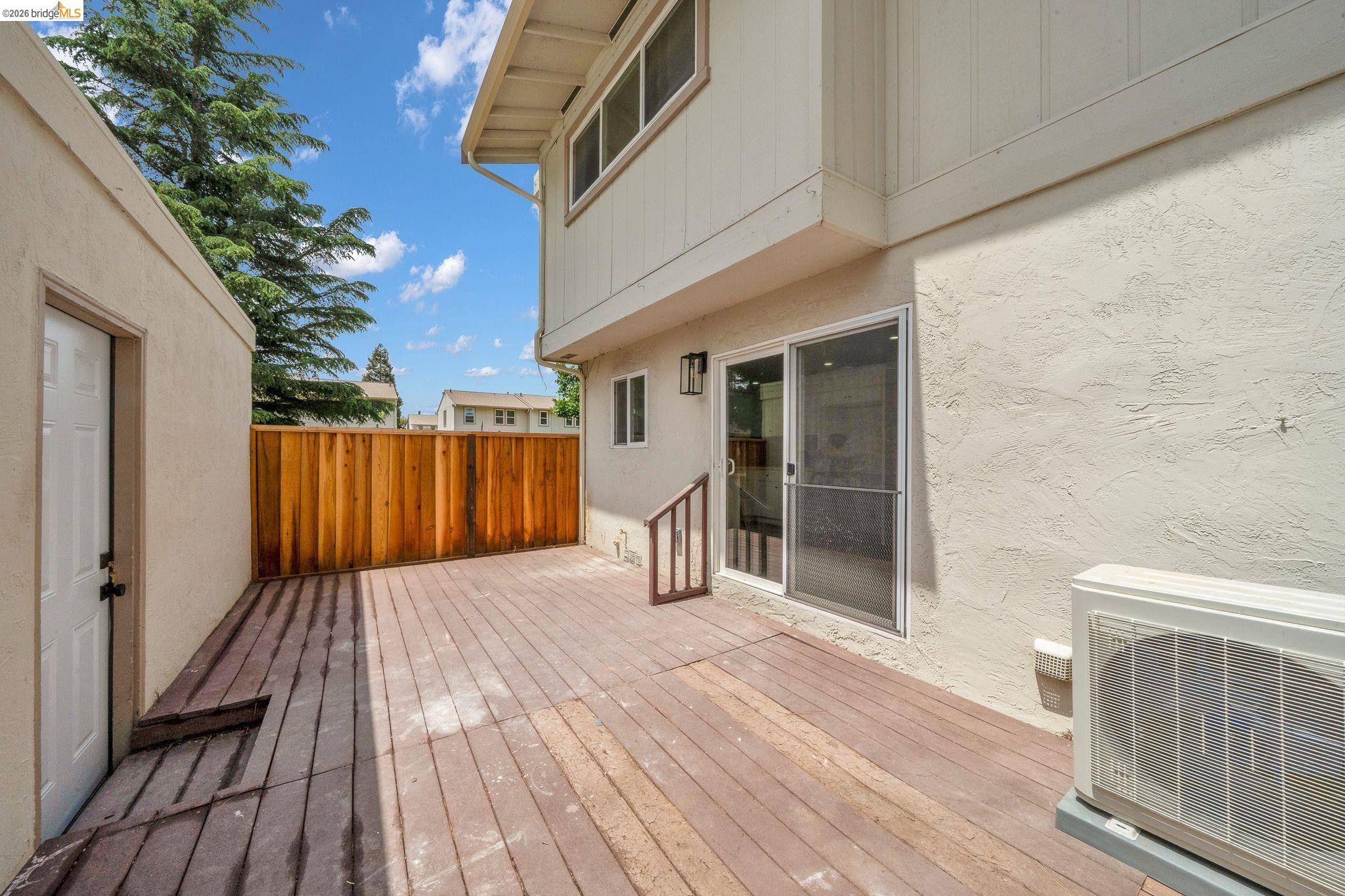 1808 Wildbrook Court, Unit D Concord, CA 94521 - Photo 41 of 47 a view of a house with a deck