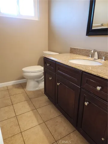 a view of hallway with wooden floor