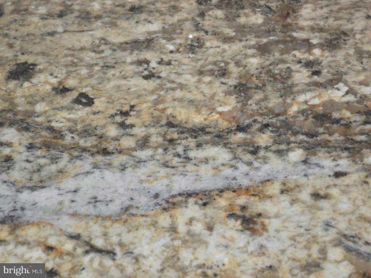 1126 Cedarcroft Road Baltimore, MD 21239 - Photo 7 of 23 a close up of a white marble wall