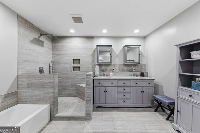 a view of a hallway with seating area
