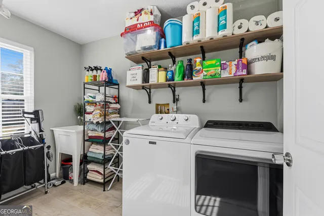 a patio with a table and chairs