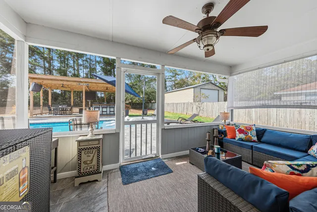 a view of a swimming pool with a patio