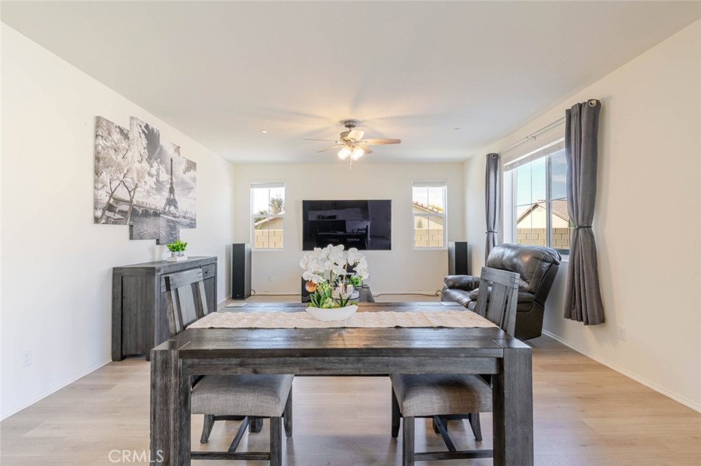2133 East Kettering Street Lancaster, CA 93535 - Photo 11 of 32 a view of a dining room with furniture and window