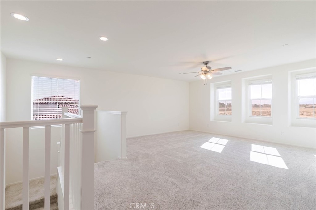 2133 East Kettering Street Lancaster, CA 93535 - Photo 13 of 32 a view of an empty room with a window
