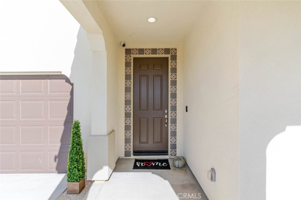 2133 East Kettering Street Lancaster, CA 93535 - Photo 2 of 32 a view of a entryway door of the house