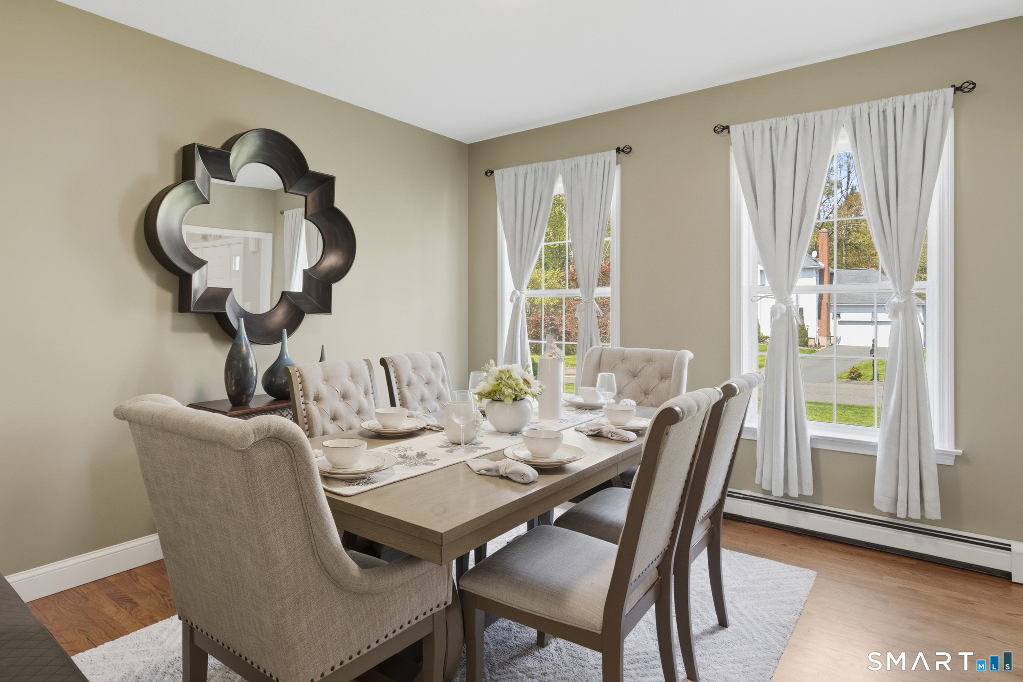 5 Ice Pond Road Granby, CT 06035 - Photo 15 of 40 a view of a dining room with furniture window and outside view
