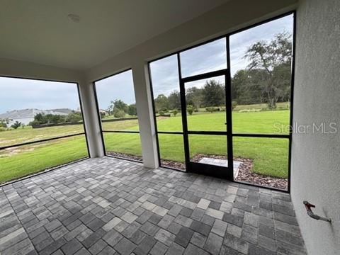 3974 Kennebunk Loop Mount Dora, FL 32757 - Photo 14 of 14 a view of a garden with an outdoor seating