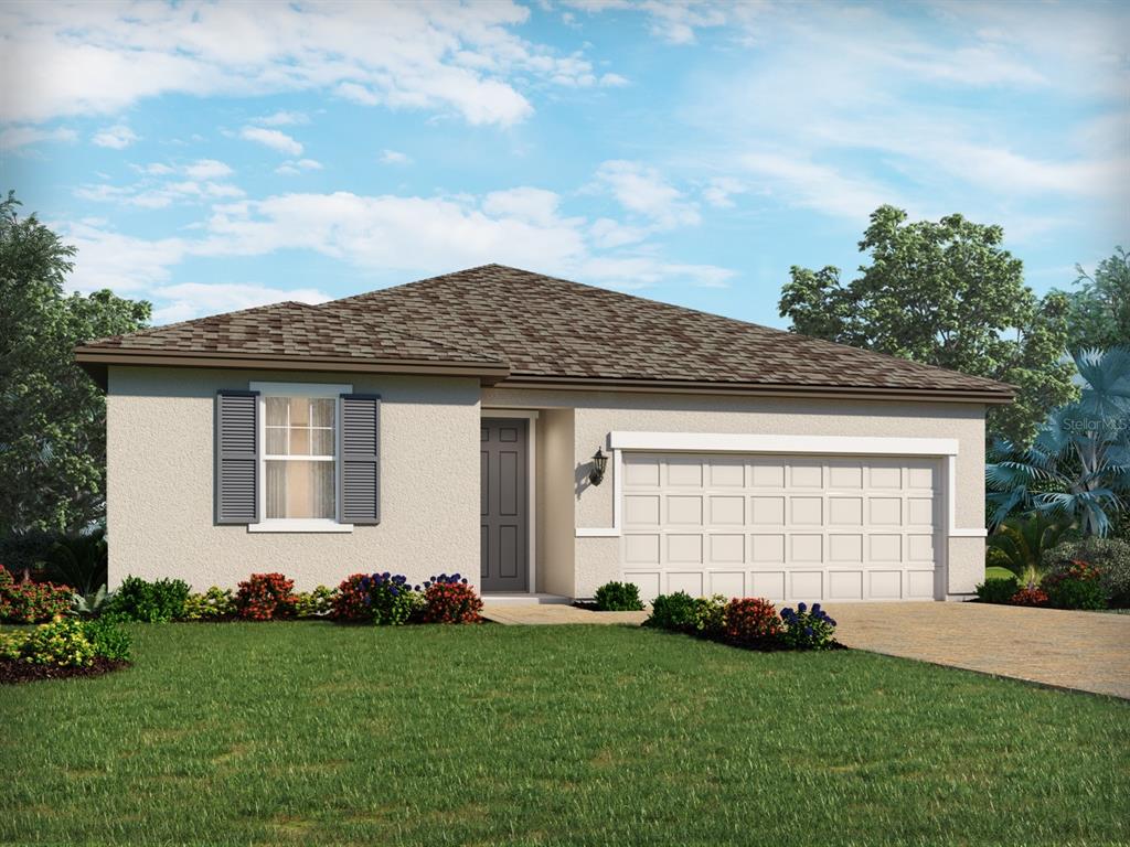 392 Birkdale Drive Daytona Beach, FL 32124 - Photo 1 of 6 a front view of a house with a garden