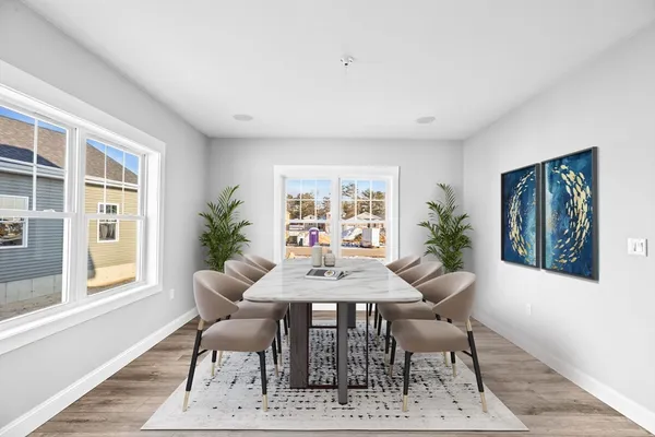 a dining room with furniture and window