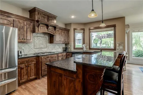 $695,000 | 18914 West 100th Street, Lenexa, KS 66220
