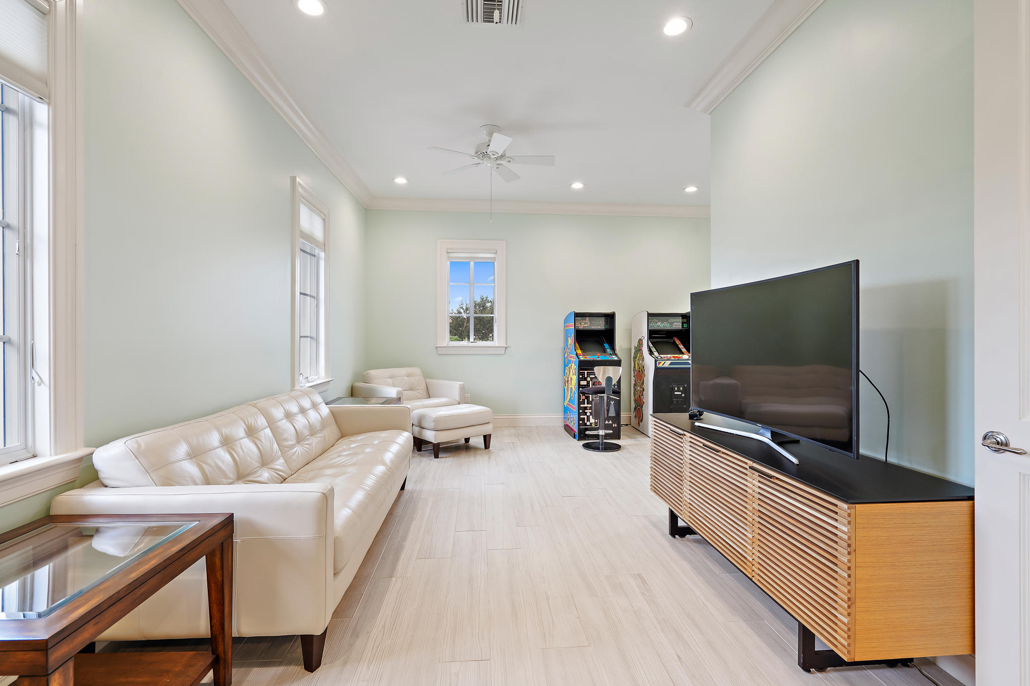 426 Red Hawk Drive Jupiter, FL 33477 - Photo 21 of 40 a living room with furniture and a flat screen tv