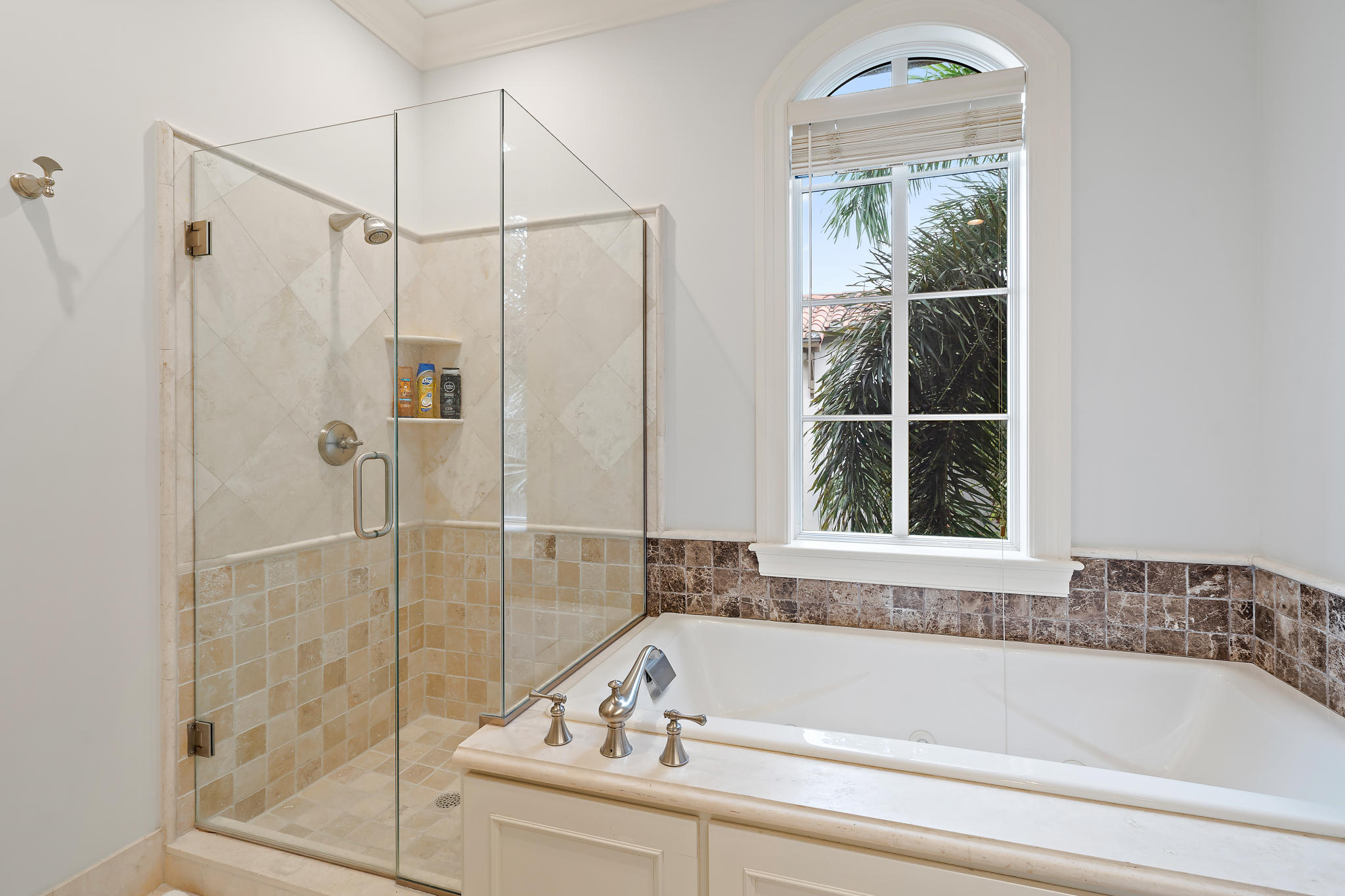 426 Red Hawk Drive Jupiter, FL 33477 - Photo 29 of 40 a bathroom with a bathtub and shower