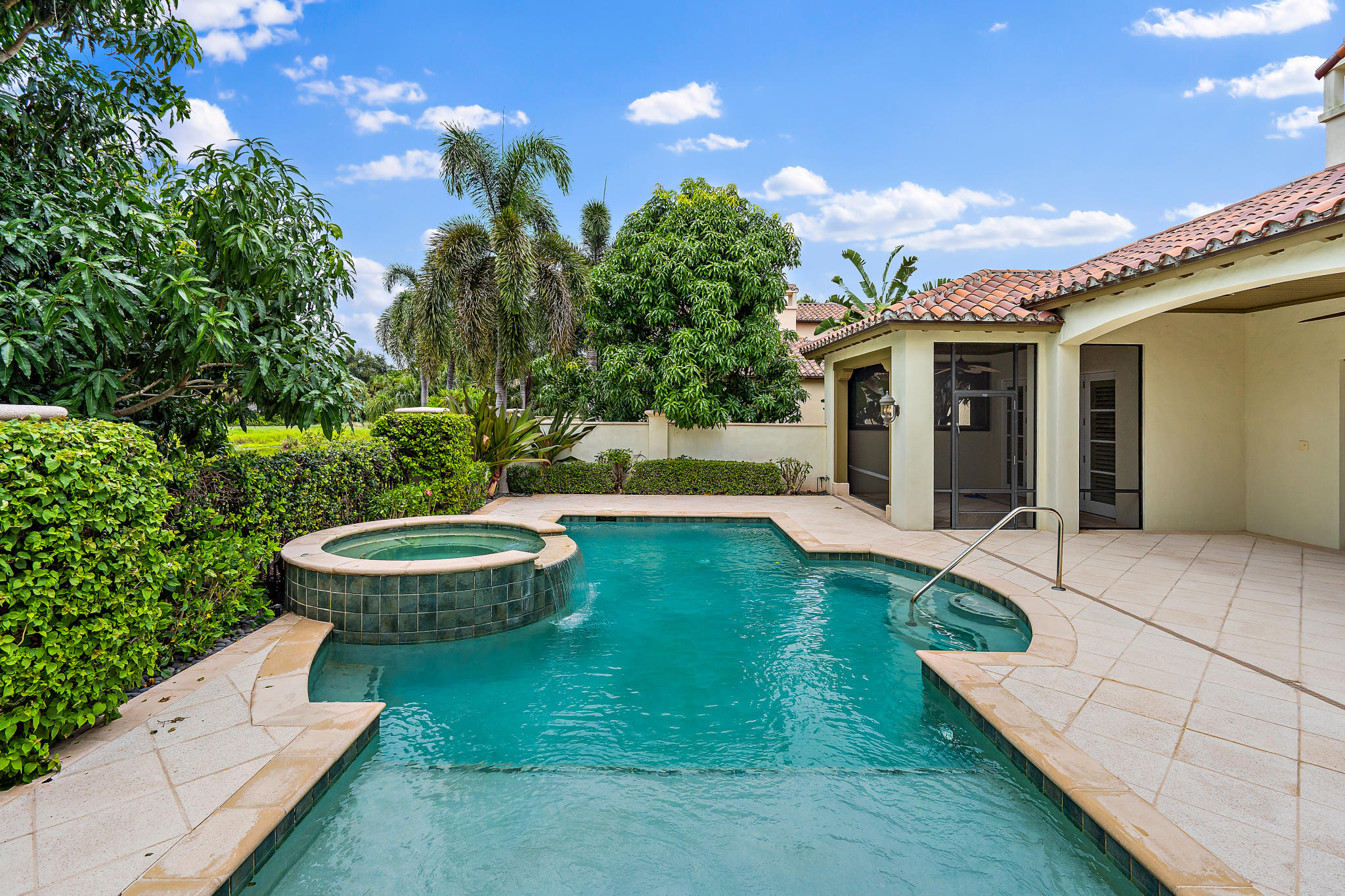 426 Red Hawk Drive Jupiter, FL 33477 - Photo 34 of 40 a view of an house with backyard space and garden