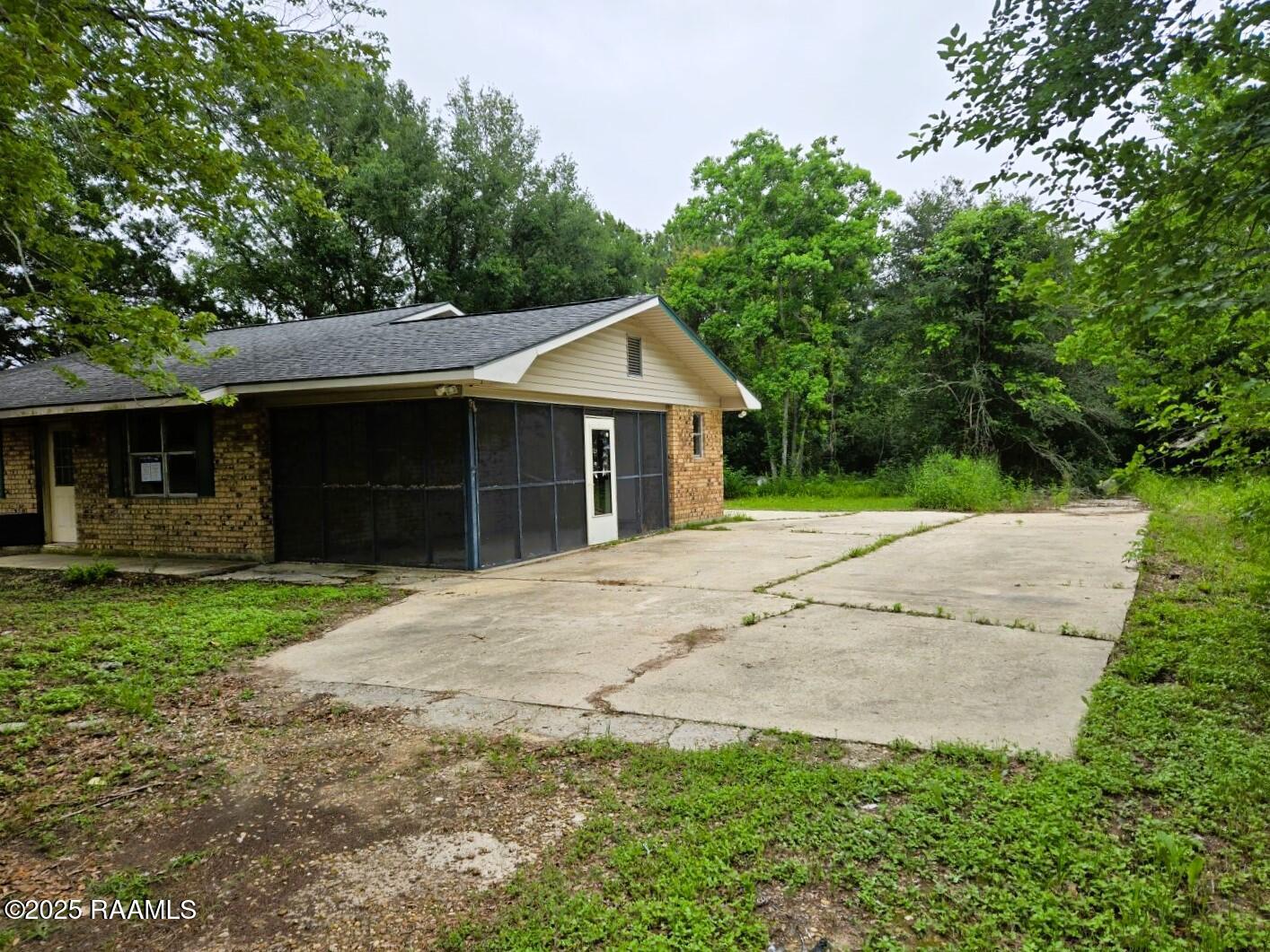 1716 Woodstone Road Eunice, LA 70535 - Photo 2 of 23 2 RIGHT SIDE