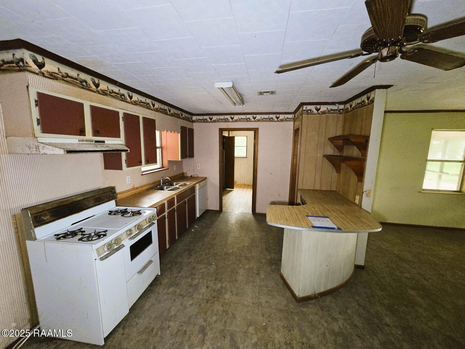 1716 Woodstone Road Eunice, LA 70535 - Photo 6 of 23 6 KITCHEN