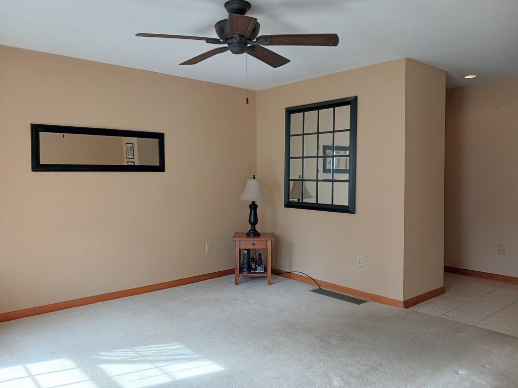 6 Winn Road Nashua, NH 03062 - Photo 13 of 33 a view of a livingroom with furniture and windows