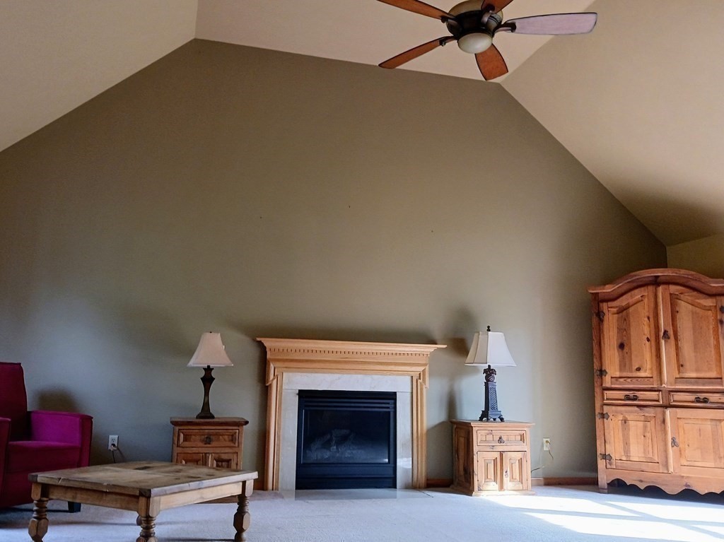 6 Winn Road Nashua, NH 03062 - Photo 17 of 33 a living room with furniture and a fireplace