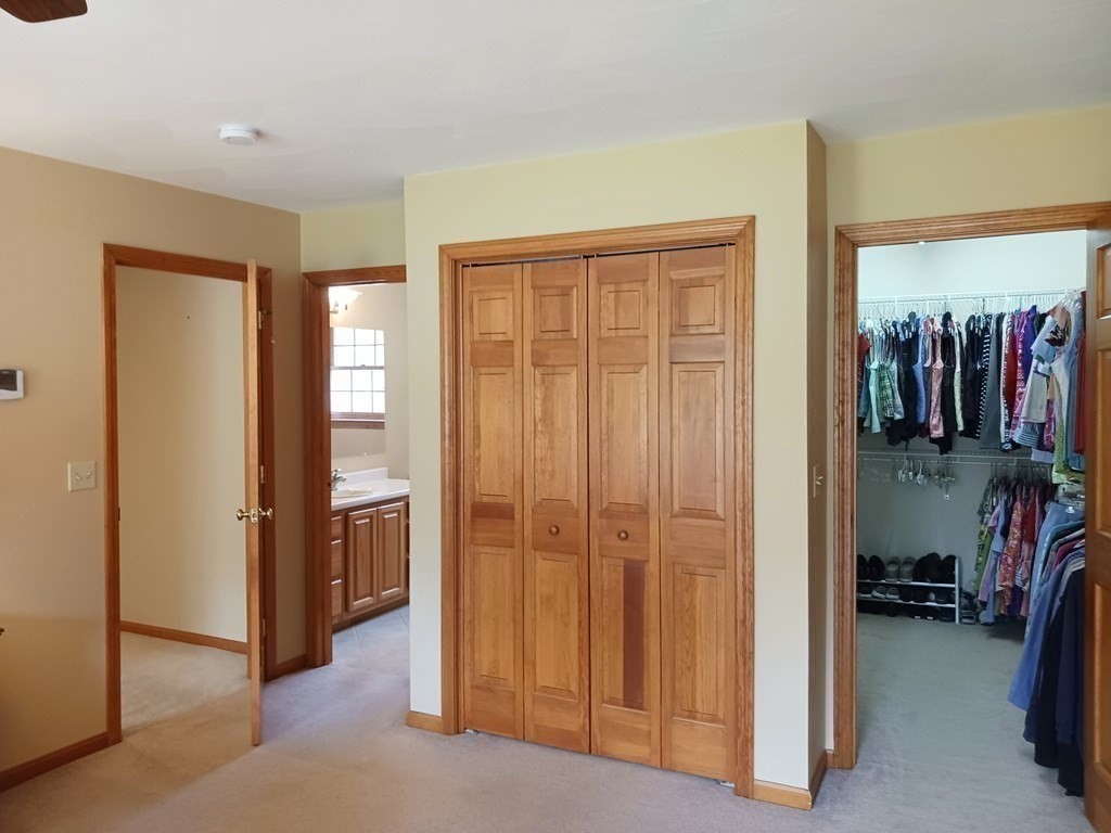 6 Winn Road Nashua, NH 03062 - Photo 24 of 33 a view of a hallway with closet and a livingroom view