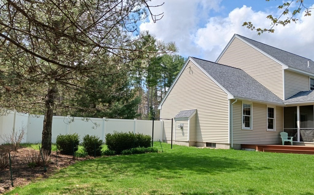 6 Winn Road Nashua, NH 03062 - Photo 5 of 33 a view of backyard with garden and plants