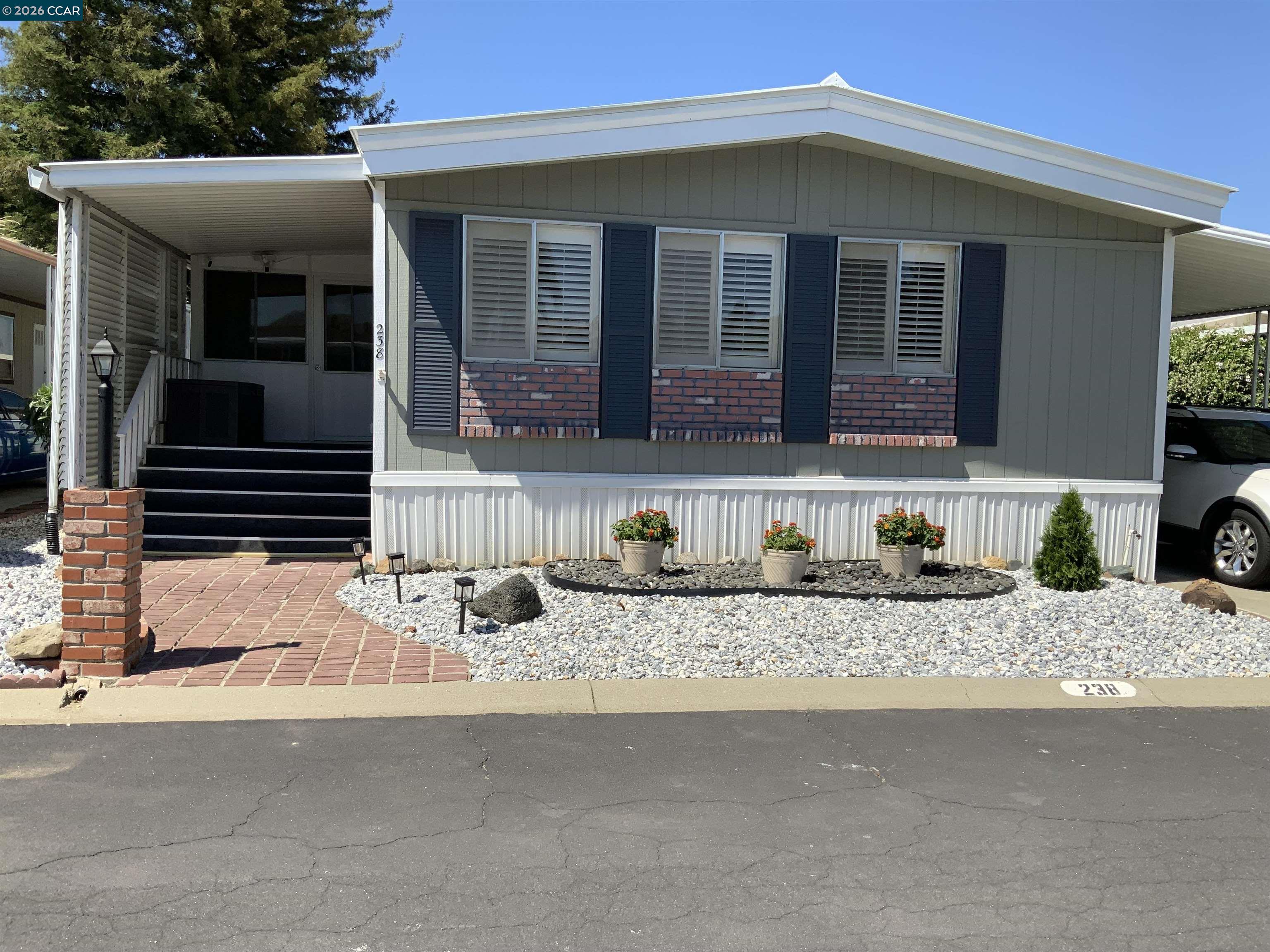 238 Aloha Pittsburg, CA 94565 - Photo 1 of 42 a backyard of a house
